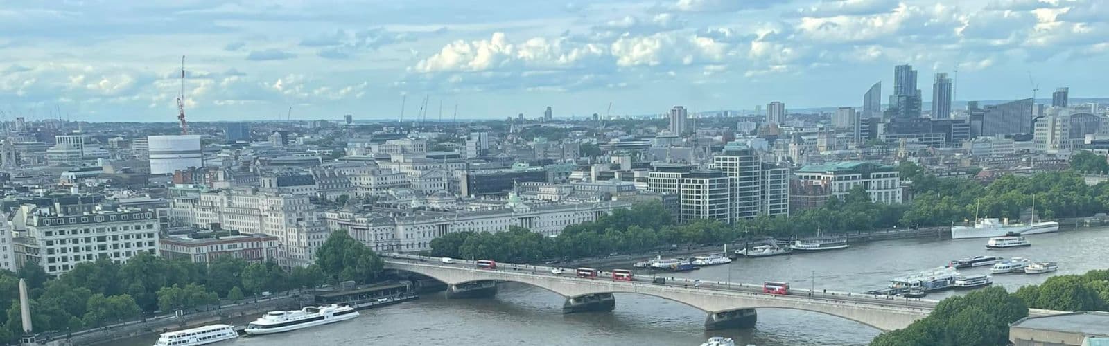 The city of London, including skyscrapers and the London Bridge, from above. 